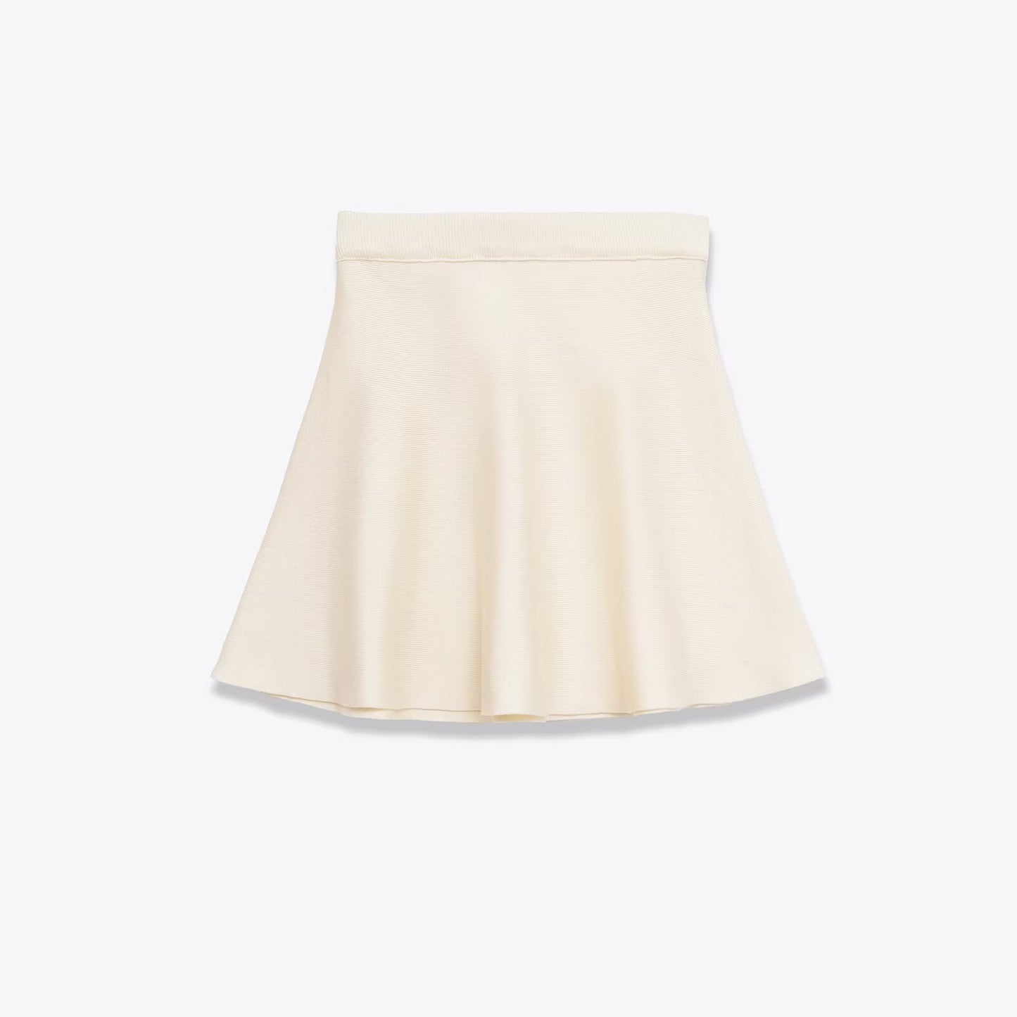 Woman wearing Loose Knit Flared Skirt in a sunny outdoor setting