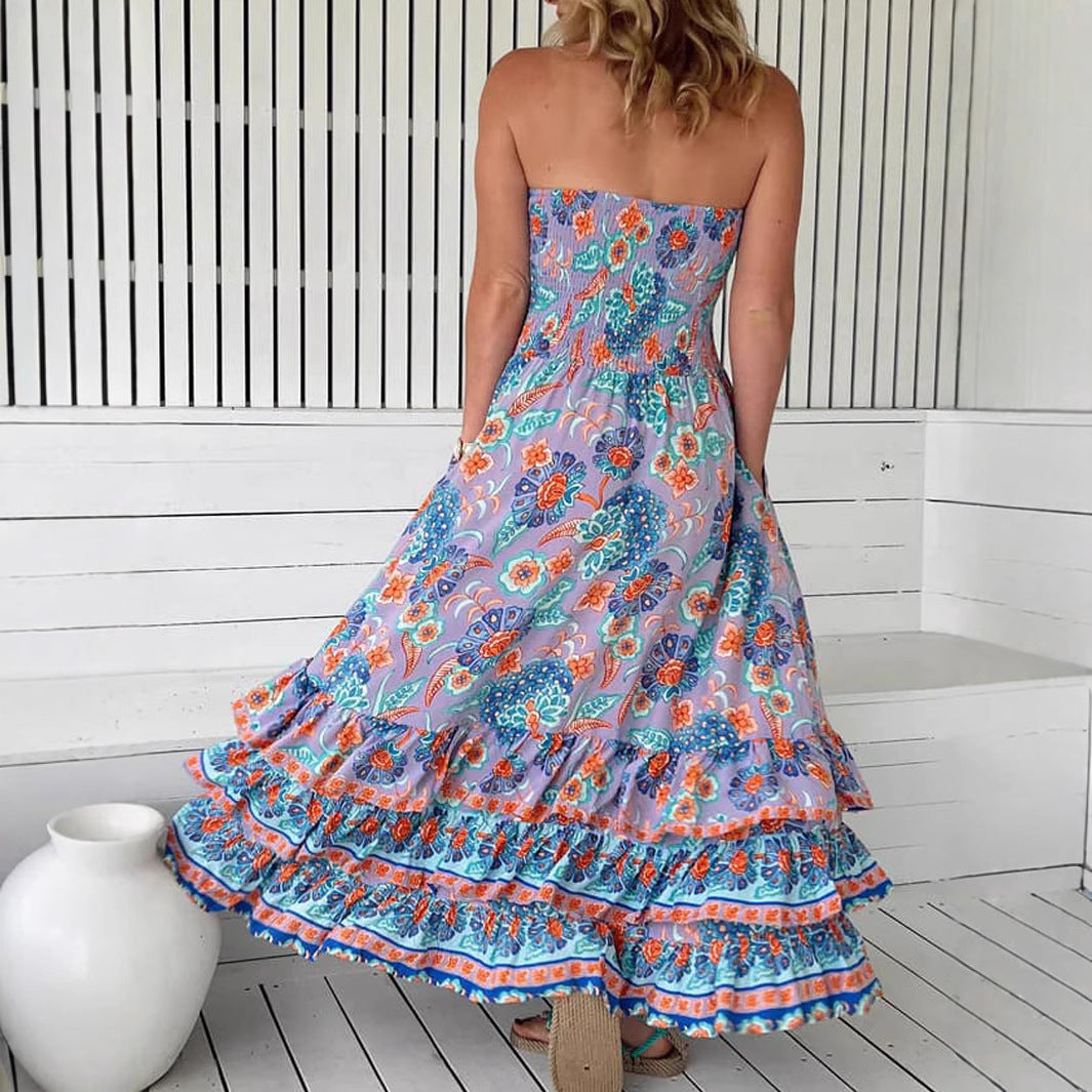 Woman wearing One-Shoulder Floral Ruffle Maxi Dress in a garden