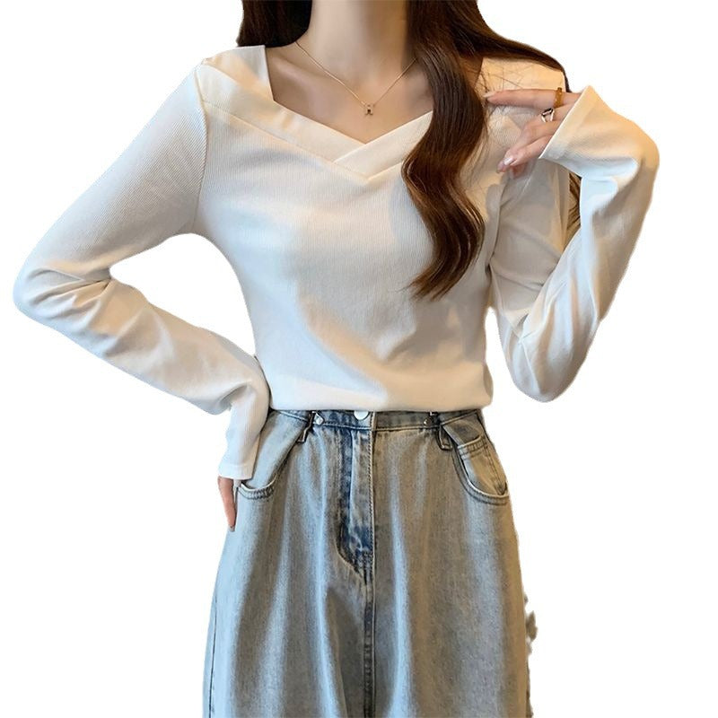Woman wearing V Neck Long Sleeve Fleece Top in a casual setting