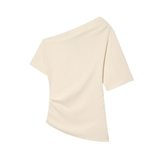 Woman wearing Asymmetric Pleated Shirt in a casual setting
