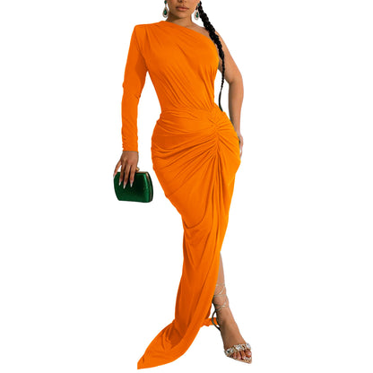 Woman wearing Asymmetric Neck Single Long Sleeve Maxi Dress in a stylish setting