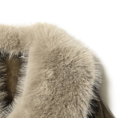 Woman wearing Artificial Fur Suede Texture Jacket in a cozy outdoor setting