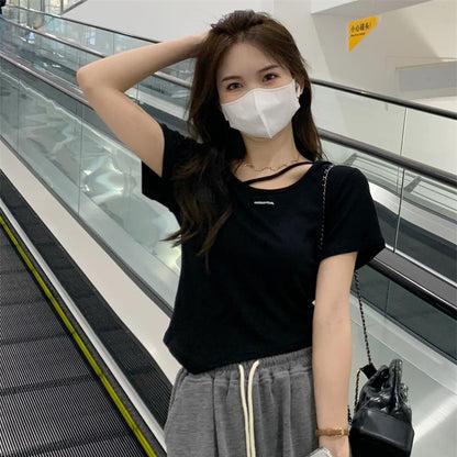 Woman wearing Irregular Design Short Sleeve Crop Top in casual setting