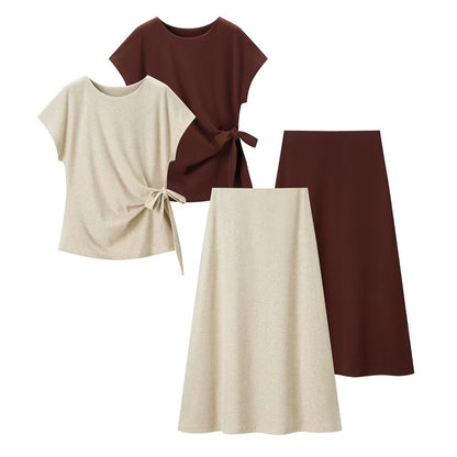Woman wearing Knot Detail Top and Flute Midi Skirt Set in a sunny outdoor setting