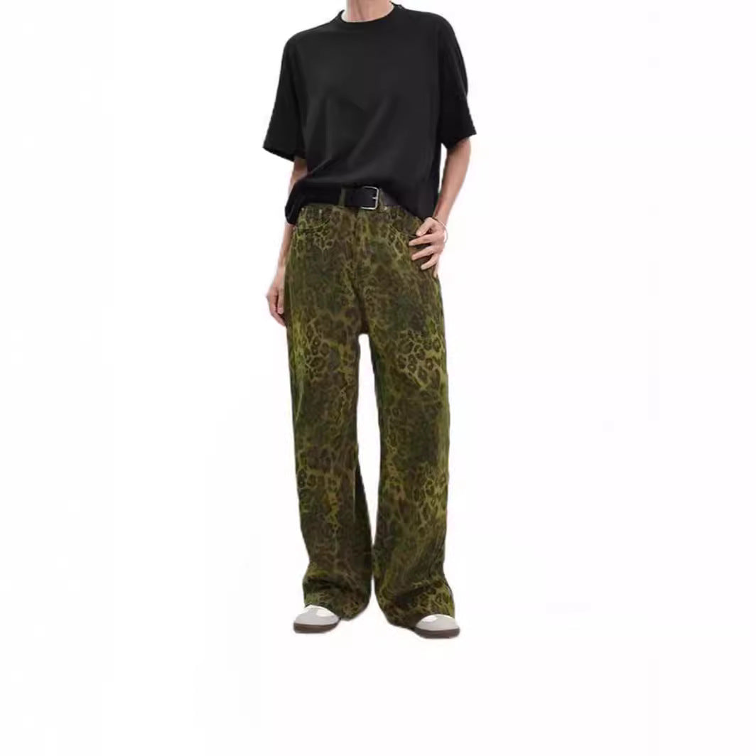 Woman wearing leopard print jeans in a stylish urban setting