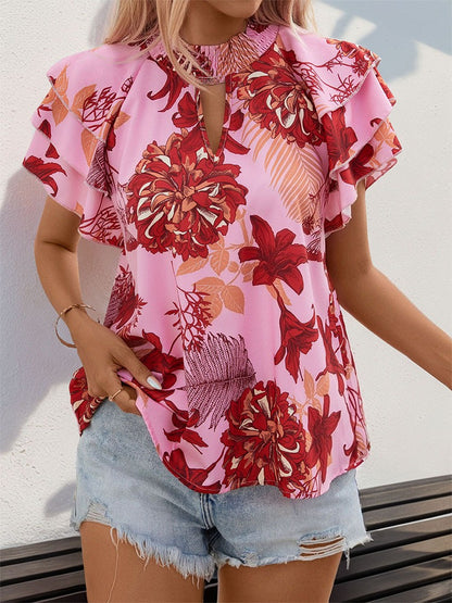 Woman wearing Lotus Leaf Layered Sleeve Printed Shirt in a sunny outdoor setting