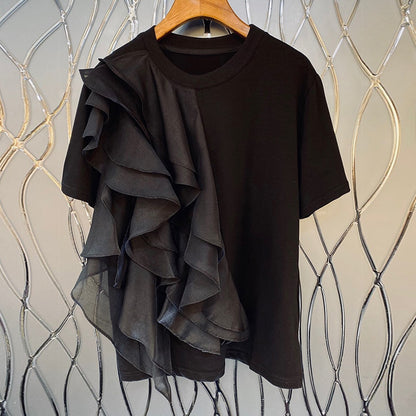Woman wearing Patchwork Ruffle T-Shirt in a casual summer setting
