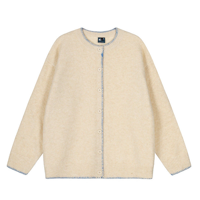 Woman wearing Hand-Stitched Loose Fit Knit Cardigan in a cozy setting
