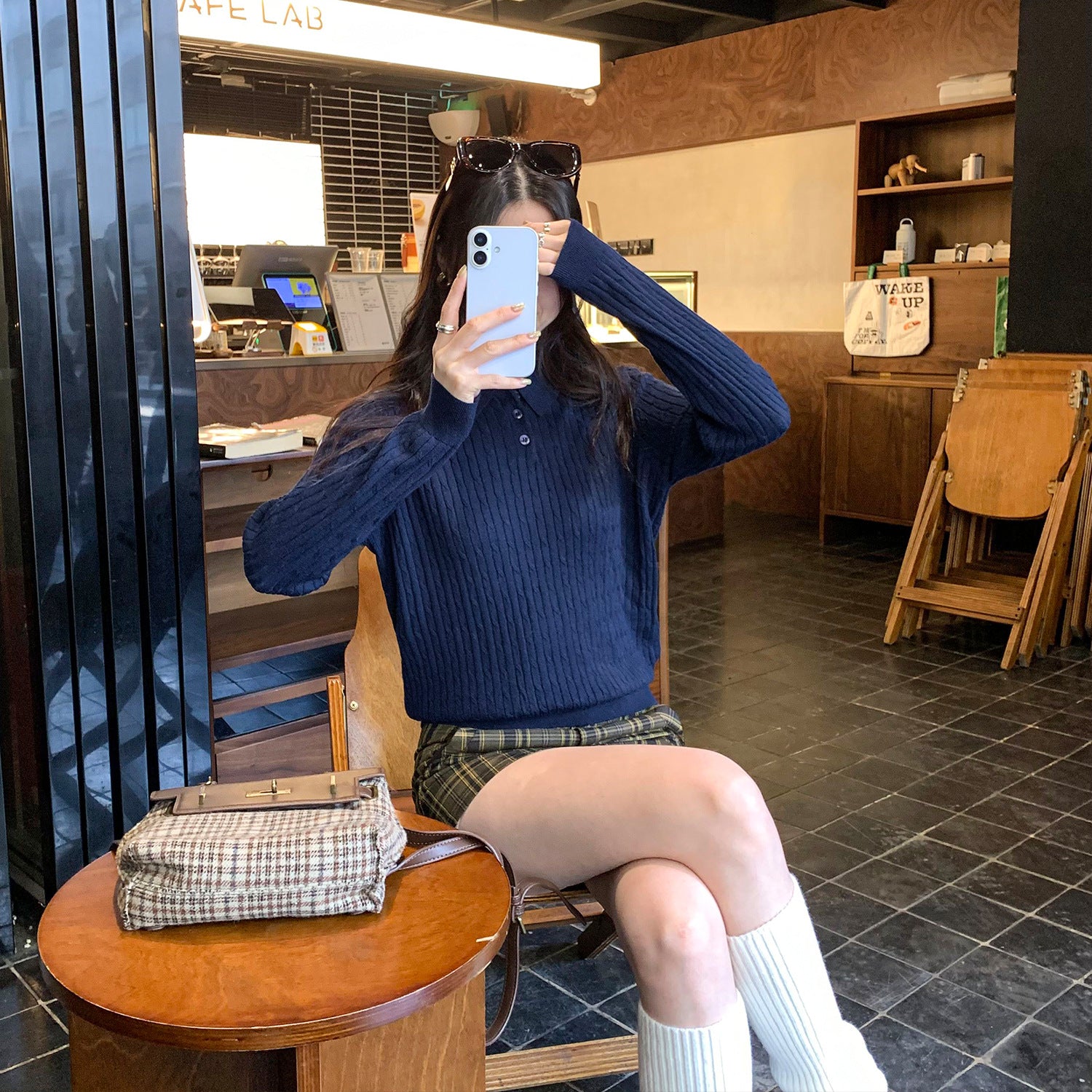 Woman wearing Slim Fit Long Sleeve Knit Sweater in a casual setting