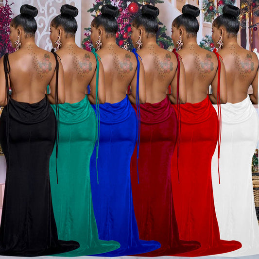Woman wearing Sleeveless Shoulder Tie Maxi Dress in a sunny outdoor setting