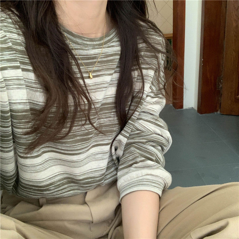Woman wearing Casual Stripe Long Sleeve T-Shirt in a casual setting