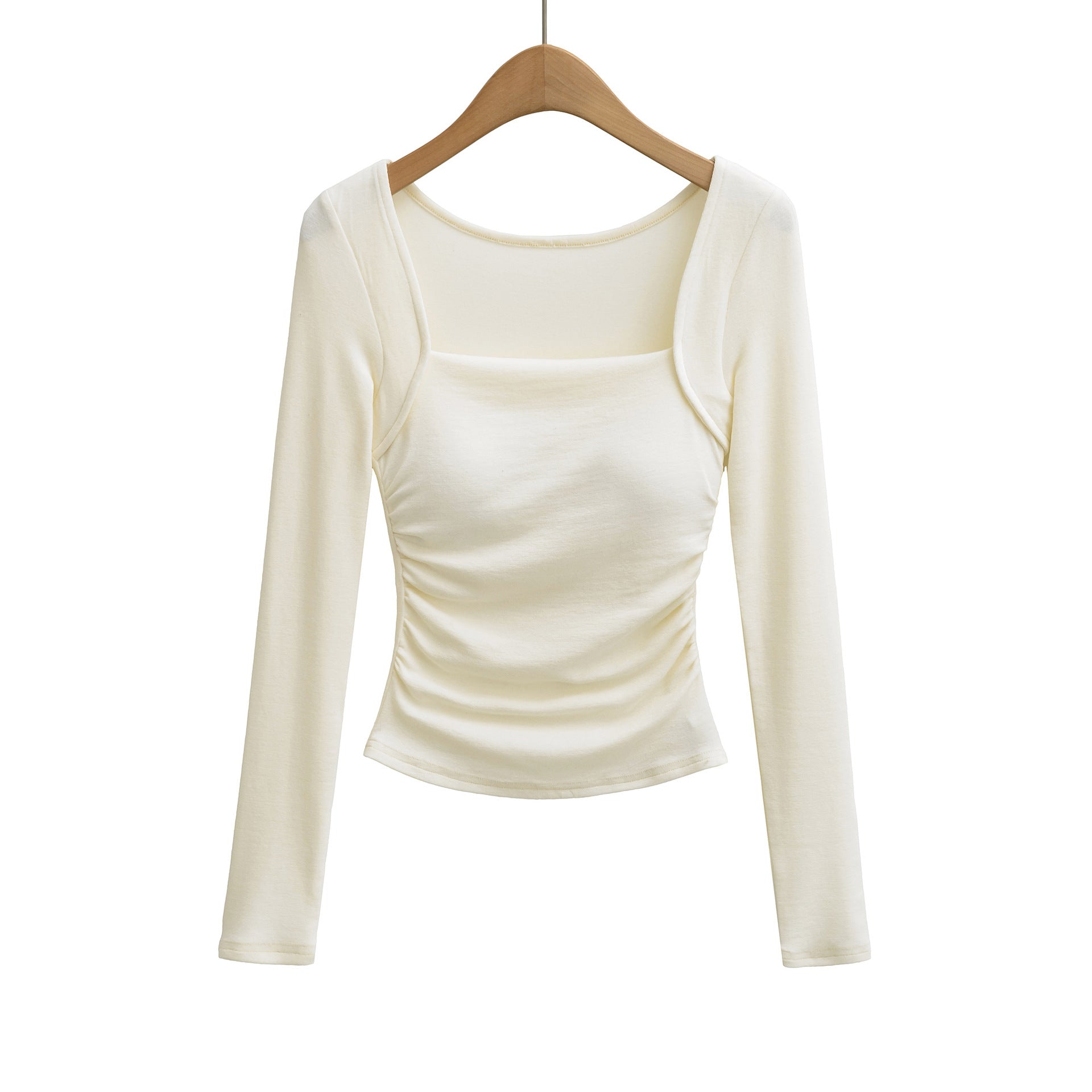 Woman wearing Square Neck Pleated Long Sleeve T-Shirt in a stylish urban setting