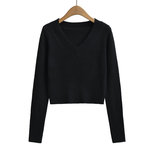 Woman wearing V Neck Long Sleeve Casual Top in a stylish urban setting