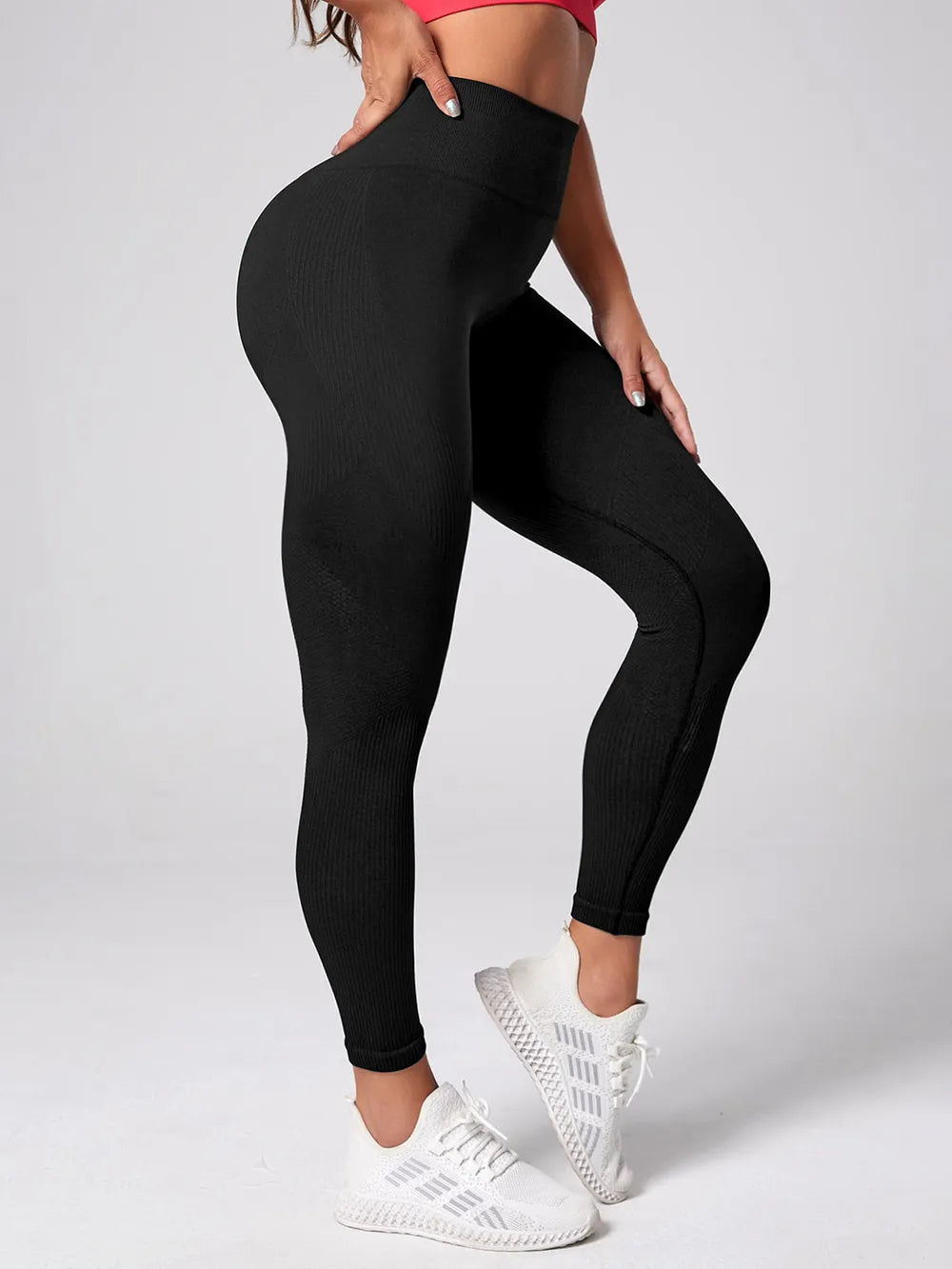 Woman wearing High Waist Active Leggings in a workout setting
