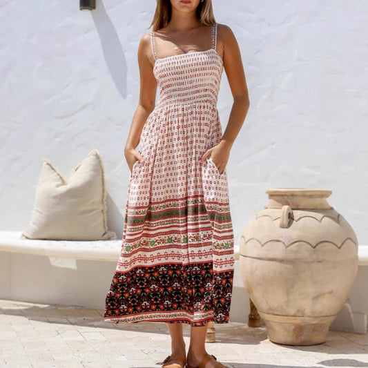 Woman wearing Sleeveless Printed Adjustable Strap Midi Dress in a sunny outdoor setting