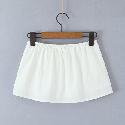 Woman wearing One Shoulder Tie Up Top and Pocket Detailed Skirt Set in a sunny outdoor setting