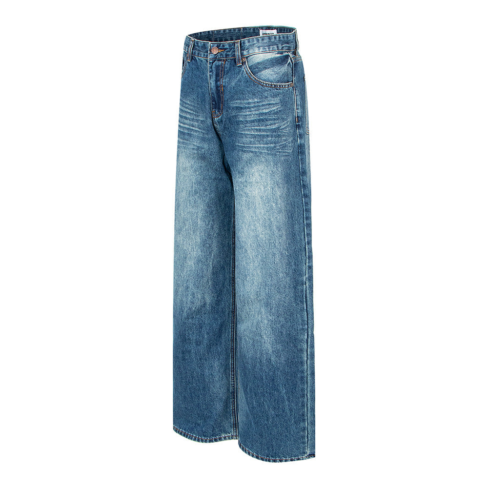 Woman wearing Vintage Washed Distressed Wide Leg Jeans in an urban setting