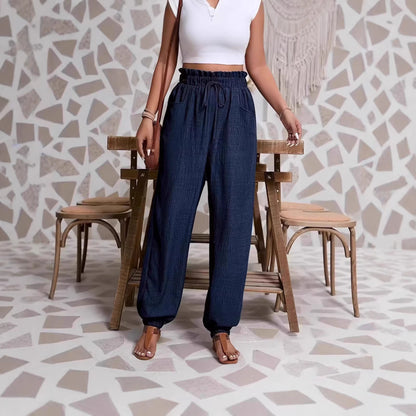 Woman wearing Elastic Solid Color Pants in a casual setting