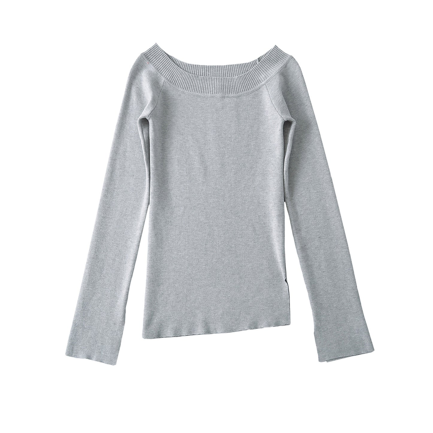 Woman wearing One Shoulder Slit Slanted Hem Top in a stylish setting