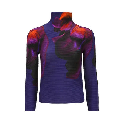 Woman wearing Miyake Pleated Corset Top in a stylish setting