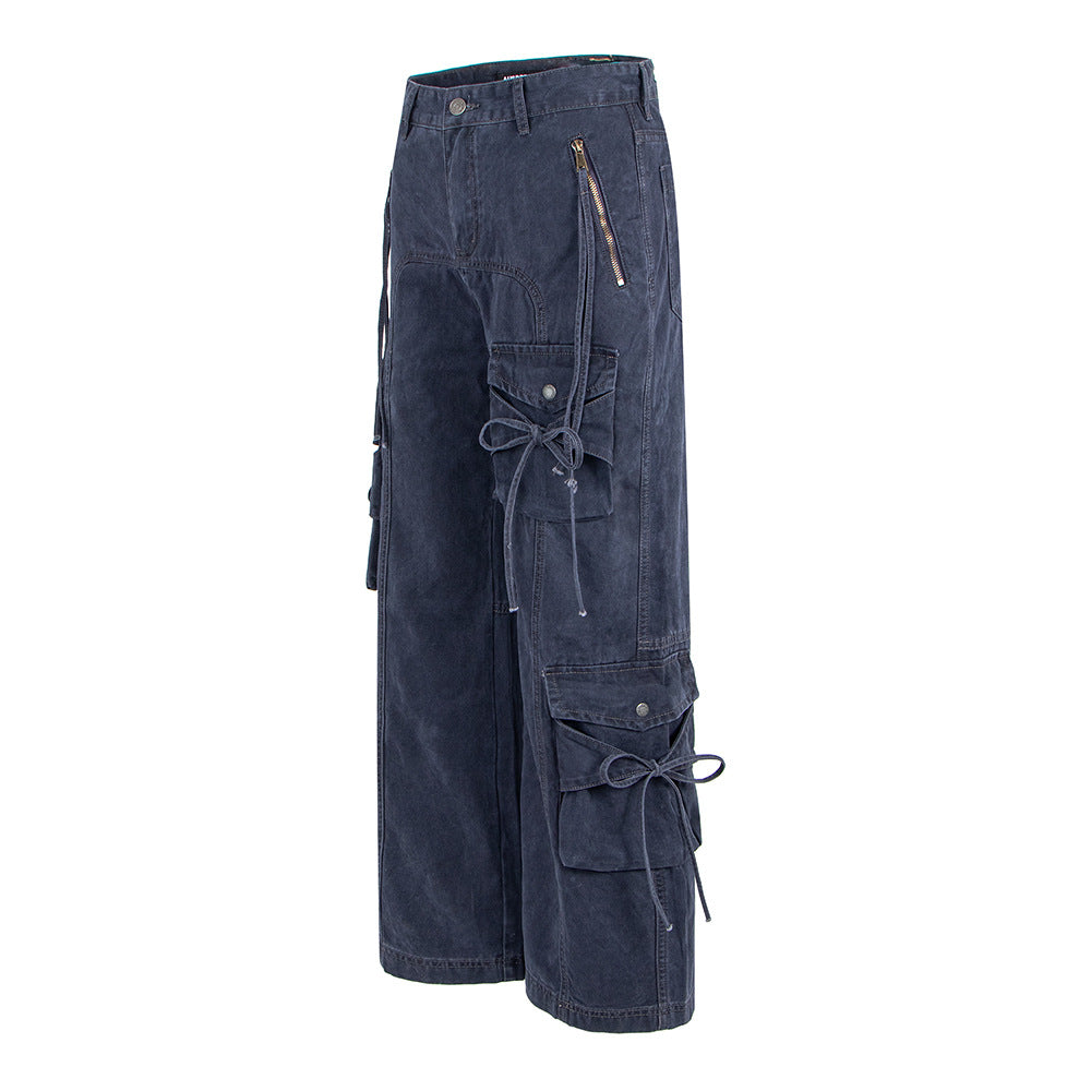 Woman wearing Spicy Girl Multi Pocket Bow Drawstring Cargo Flared Jeans in a casual setting