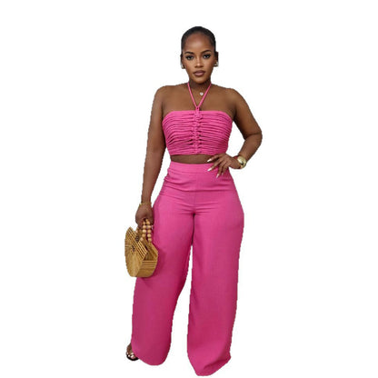 Woman wearing Drawstring Tie-Up Top and High Waist Loose Long Pants Set in a city setting