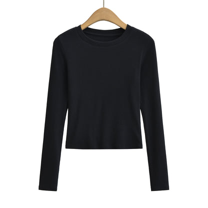 Woman wearing Slim Fit Long Sleeve T-Shirt in a casual setting