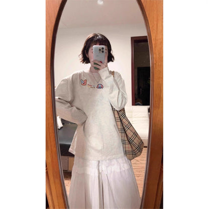 Woman wearing Geometric Pattern Long Sleeve Top in a casual setting