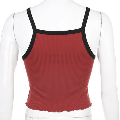 Woman wearing Contrast Color Strapless Crop Top in a summer setting