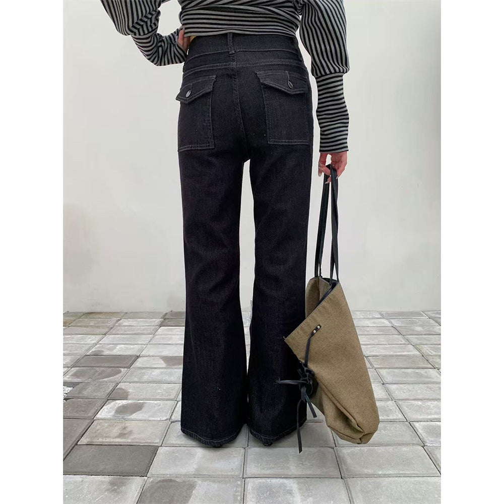 Woman wearing Retro Double Buckle Flared Jeans in a urban street setting