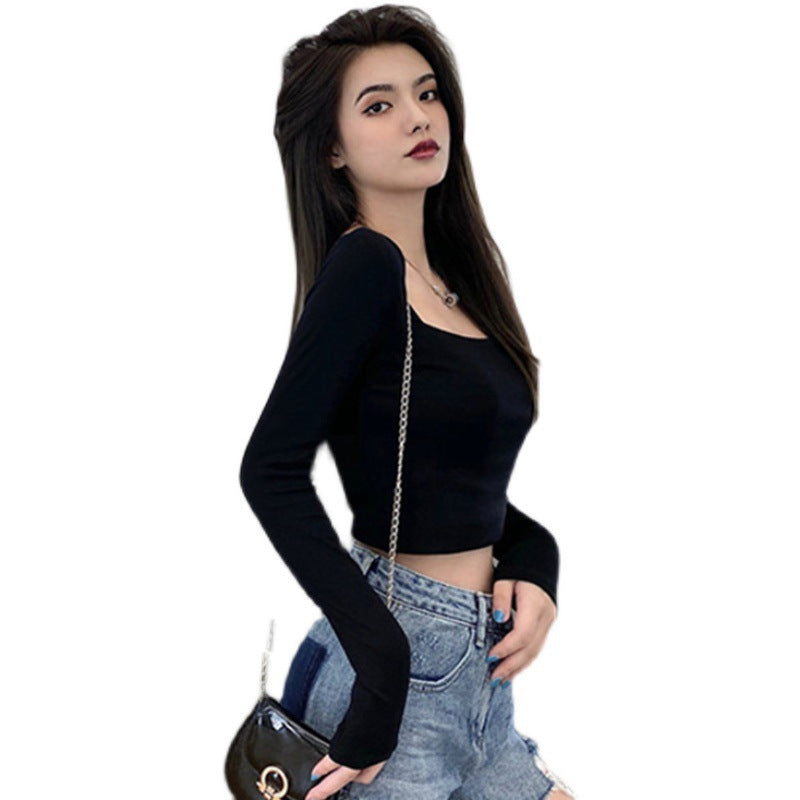 Woman wearing Slim Fit Round Neck Long Sleeve Basic T-Shirt in a casual setting