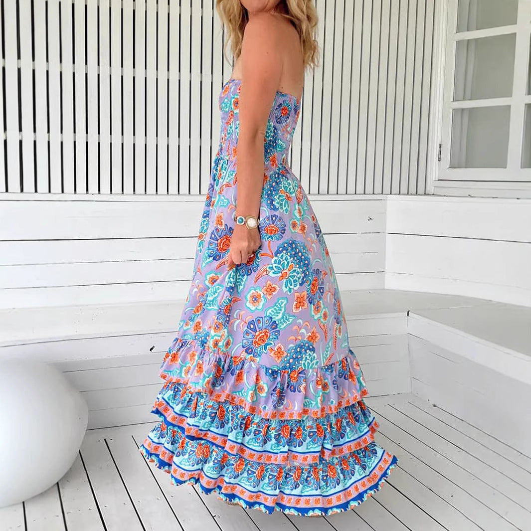 Woman wearing One-Shoulder Floral Ruffle Maxi Dress in a garden