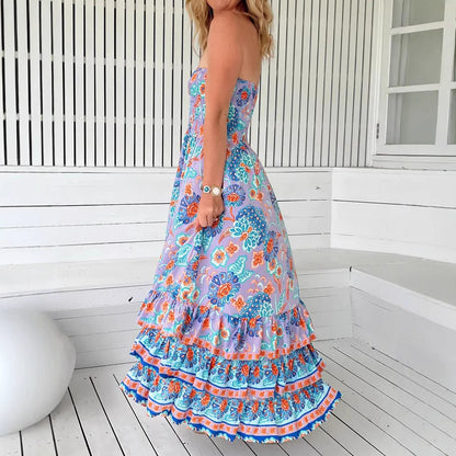 Woman wearing One-Shoulder Floral Ruffle Maxi Dress in a garden