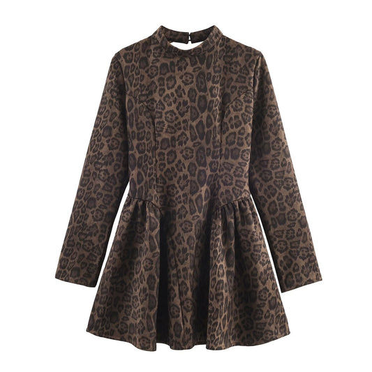 Woman wearing Leopard Print Short Dress with Long Sleeves in an evening setting