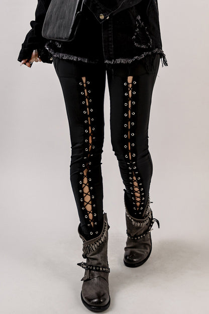 Woman wearing Black Grommet Lace Up Front Leggings in a stylish setting