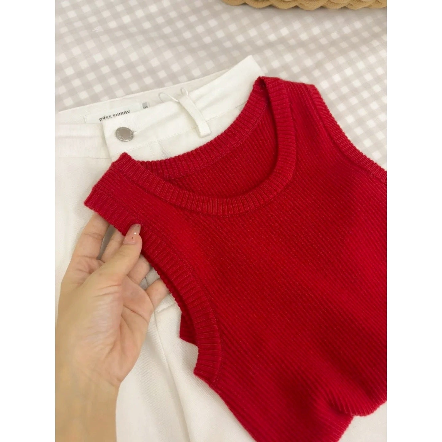 Woman wearing Knitted Camisole Top in a casual setting