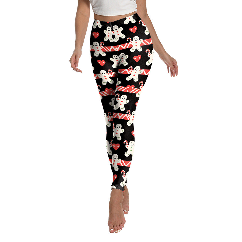 Woman wearing Christmas Snowman Cookies Sports Leggings in a festive setting