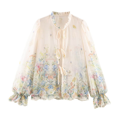 Woman wearing Embroidered Lantern Sleeve Shirt with Lace-Up Tie in a stylish setting