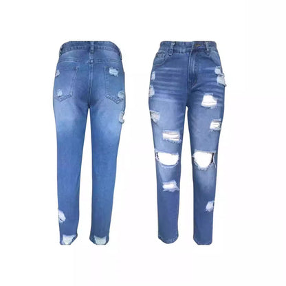Woman wearing Ripped Mid Waist Jeans in a casual outdoor setting