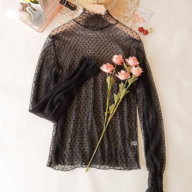 Woman wearing Transparent Korean Lace Blouse in a casual outdoor setting
