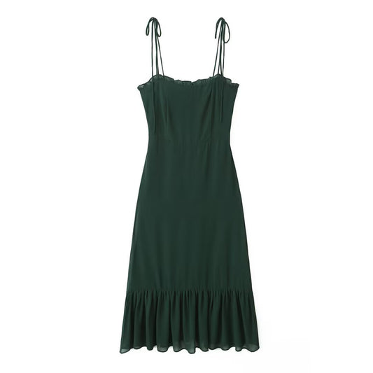 Woman wearing Dark Green Fitted Sleeveless Long Dress in a stylish setting