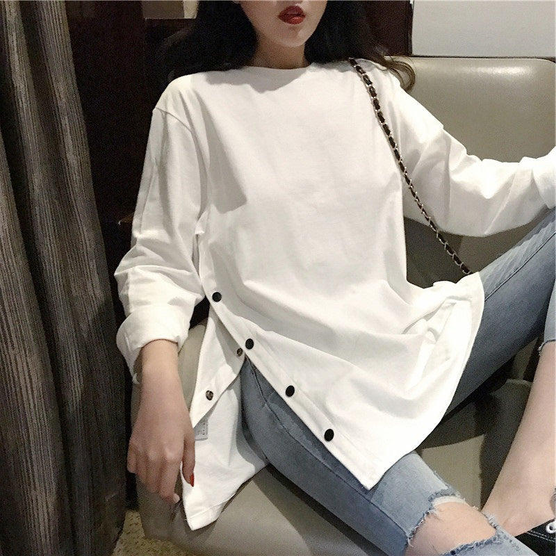 Woman wearing Plus Size Long Sleeve Midi Top in a casual setting