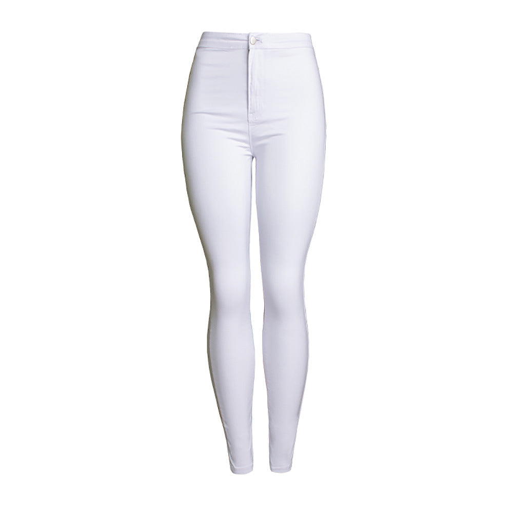 Woman wearing High Waist White Skinny Stretch Denim Jeans in a stylish outdoor setting