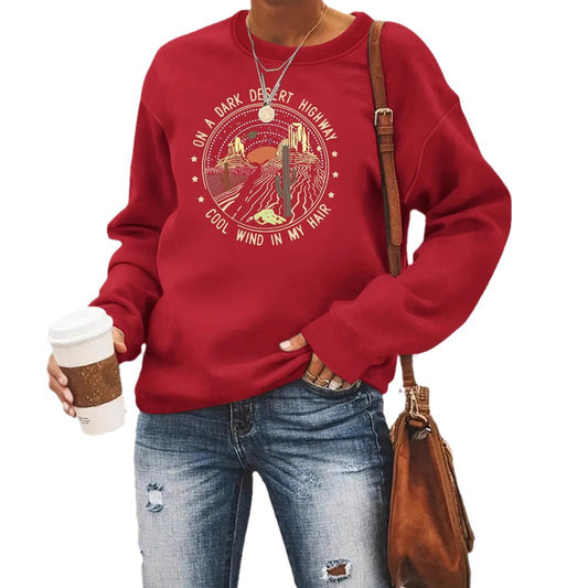 Woman wearing Printed Loose Hoodie in a casual setting