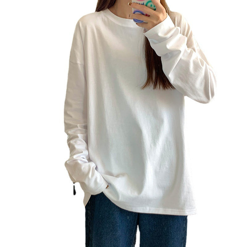 Woman wearing Women's Long Sleeve Loose Fit Basic Tee Top in a casual setting