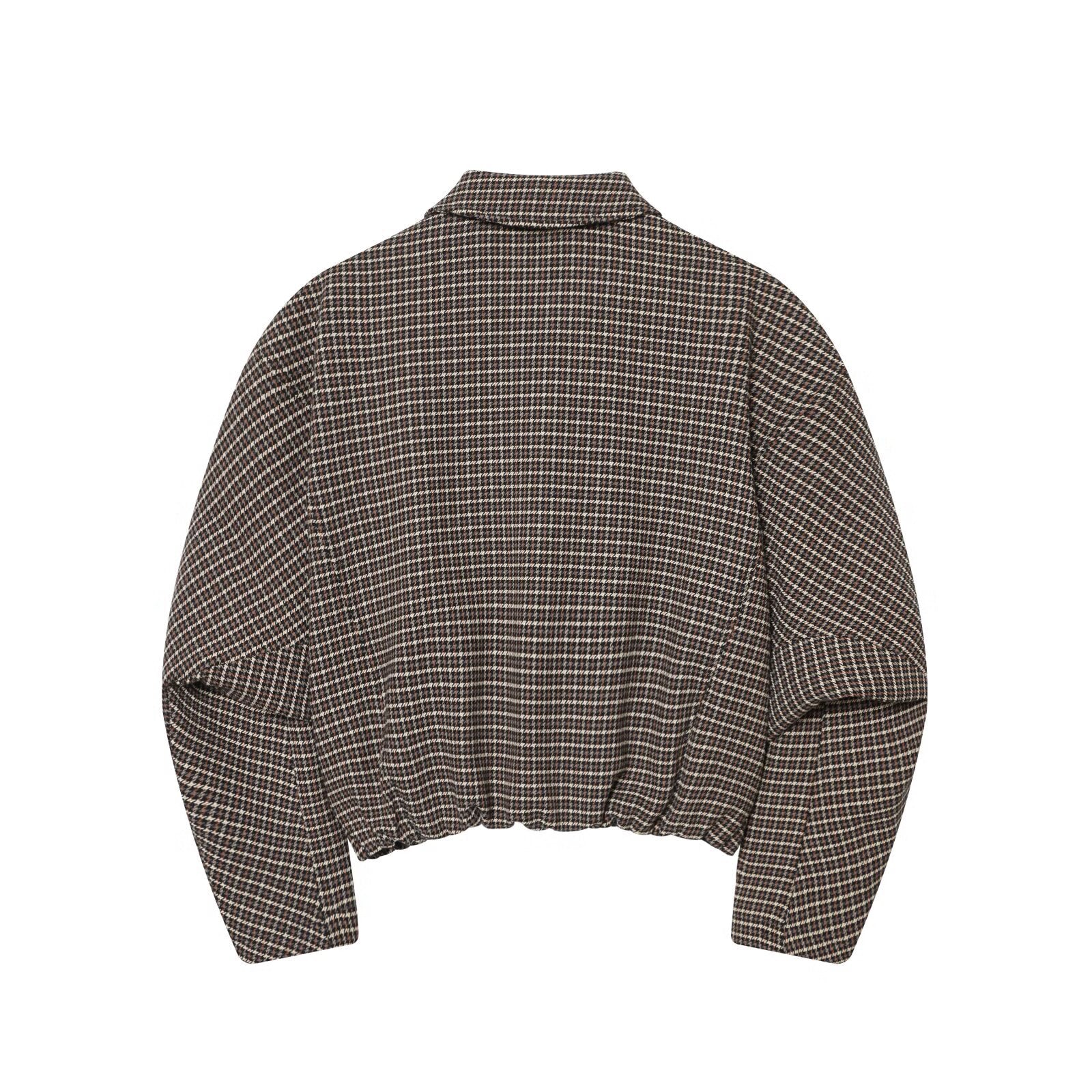 Woman wearing Houndstooth Jacket and Waistband Skirt Pants Set in a stylish urban setting