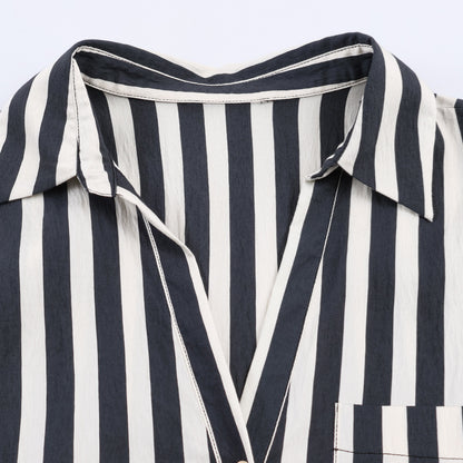 Woman wearing Lace Up Striped Shirt in a casual setting