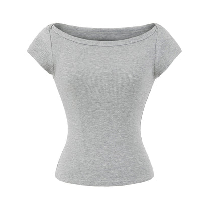 Woman wearing Elegant Short Sleeve Top in a stylish setting