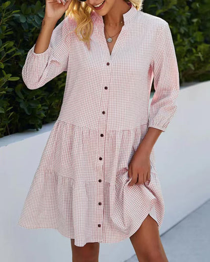 Woman wearing Chic Plaid Stand Collar Dress in a city setting