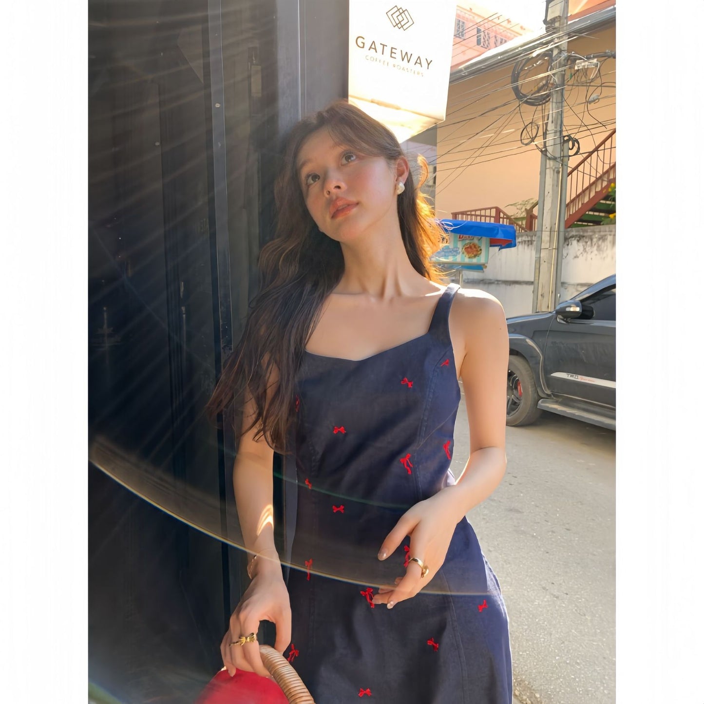 Woman wearing Cowboy Camisole Dress in a sunny park